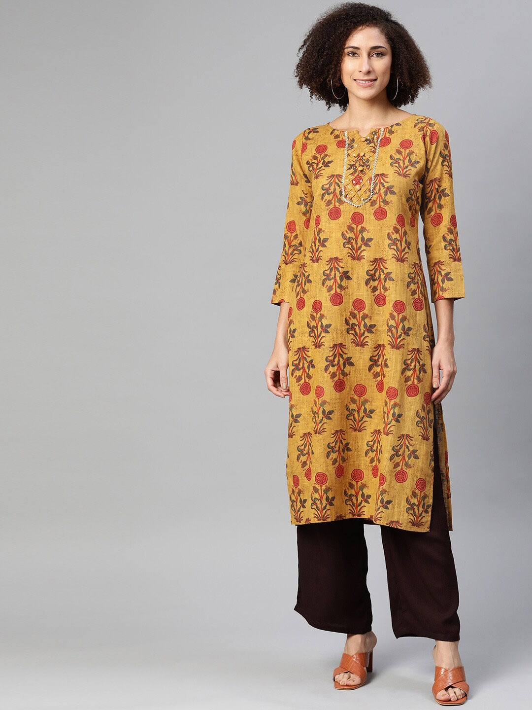 

Ives Women Mustard Yellow Ethnic Motifs Printed Pure Cotton Kurta with Palazzos