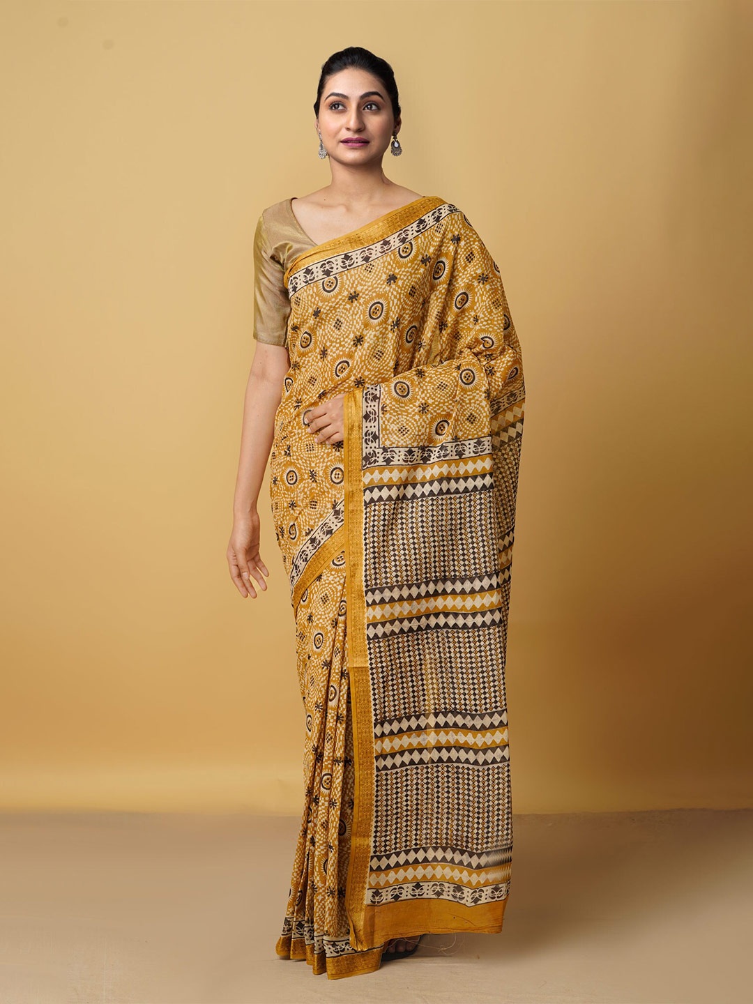 

Unnati Silks Brown & Mustard Ethnic Motifs Bagru Saree