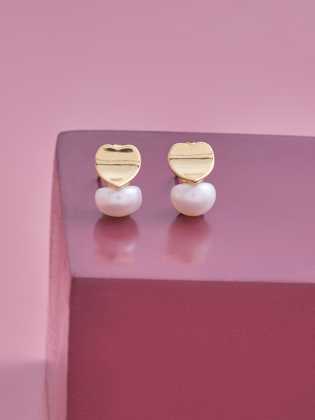 

Kushal's Fashion Jewellery White Contemporary Studs Earrings