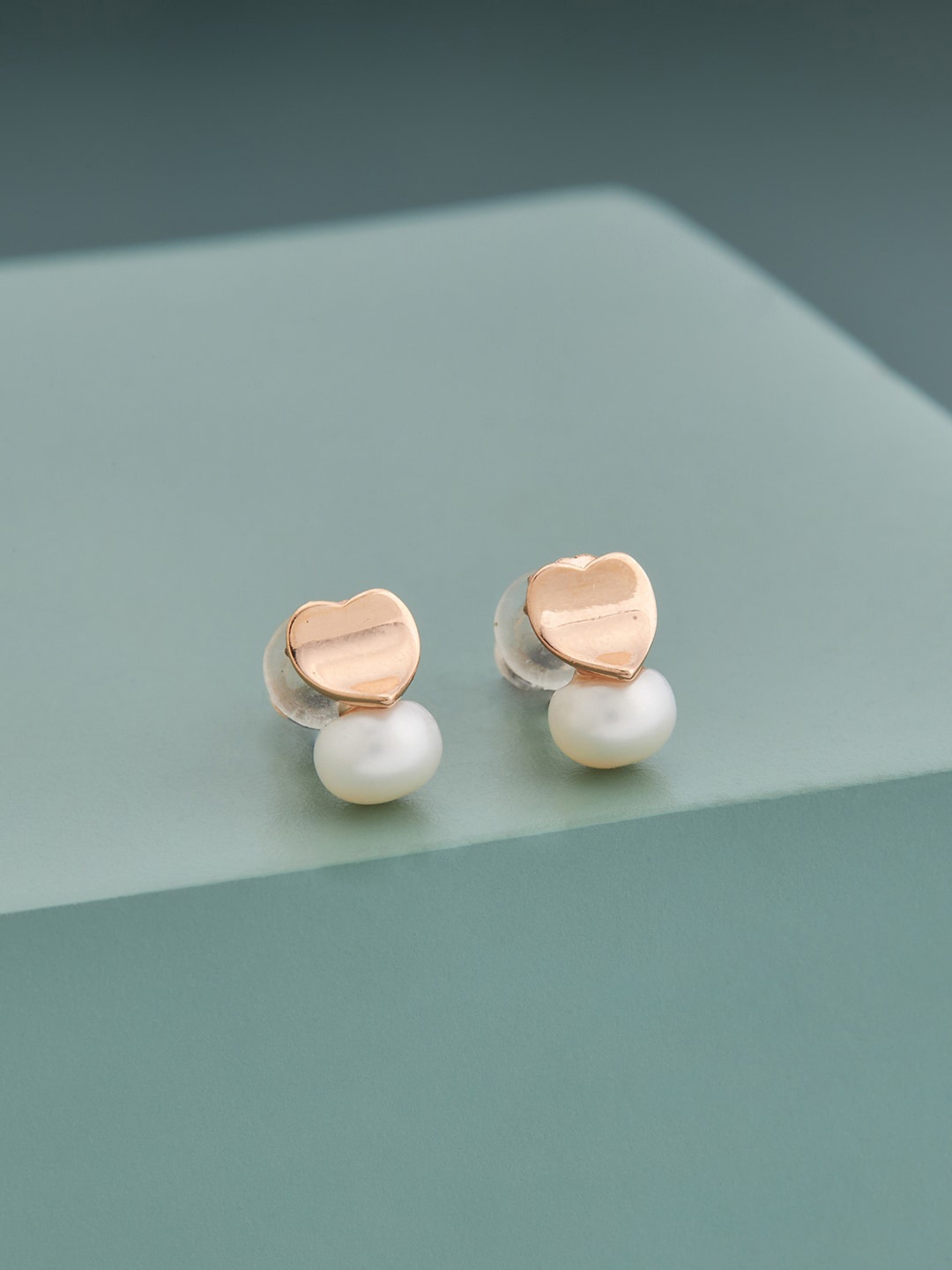 

Kushal's Fashion Jewellery White Contemporary Studs Earrings