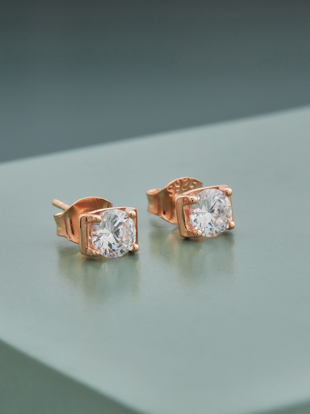 

Kushal's Fashion Jewellery White Contemporary Rose-Gold Plated Studs Earrings