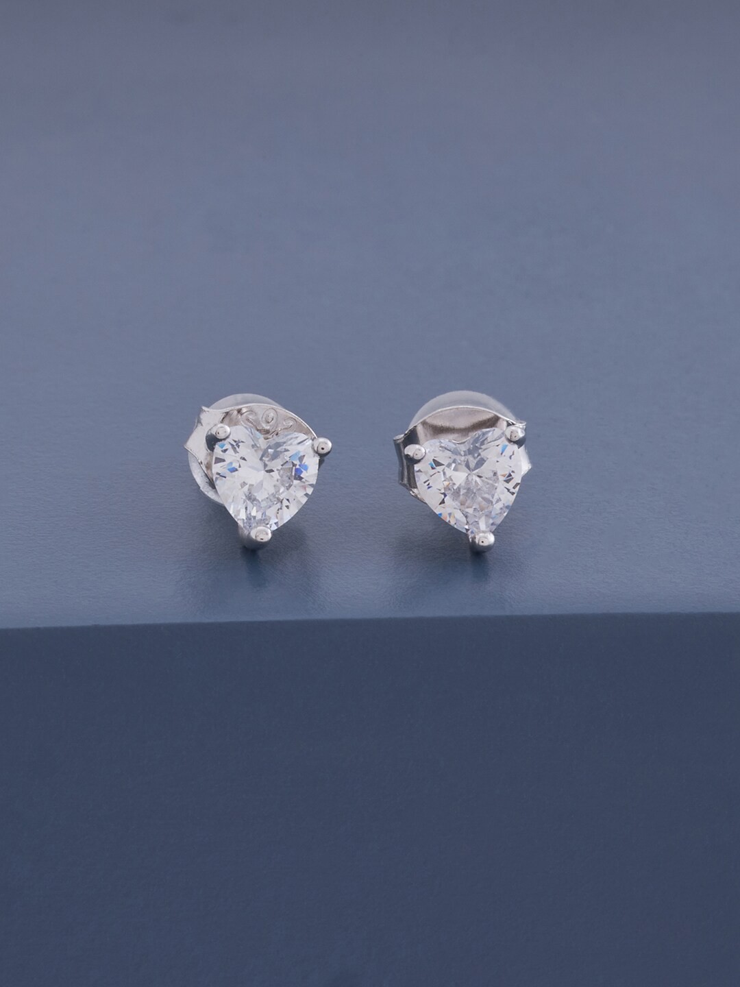 

Kushal's Fashion Jewellery White Contemporary Studs Earrings