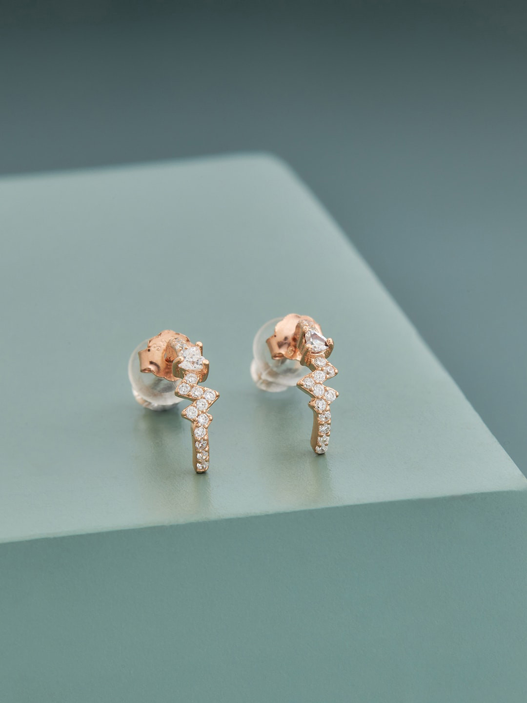 

Kushal's Fashion Jewellery White & Gold Plated Contemporary Studs Earrings