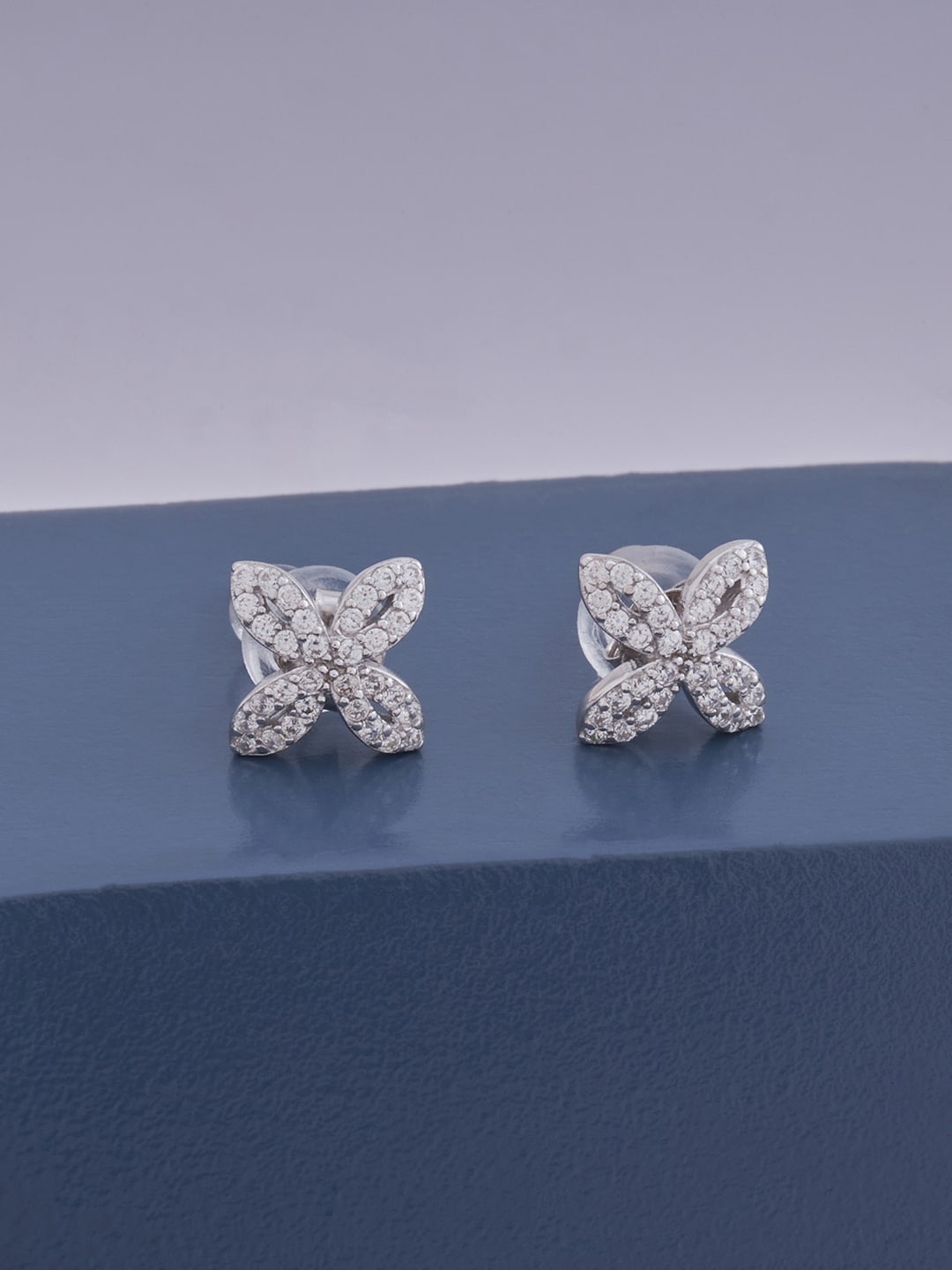 

Kushal's Fashion Jewellery White Contemporary Studs Earrings