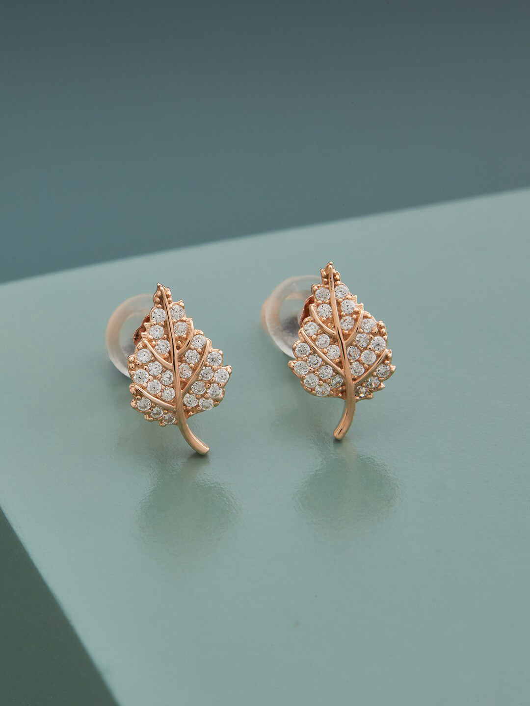

Kushal's Fashion Jewellery White Contemporary Rose Gold-Plated Studs Earrings