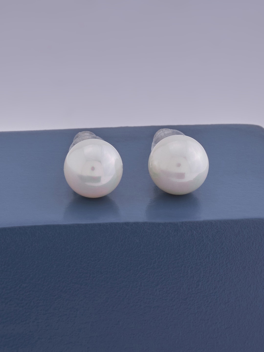 

Kushal's Fashion Jewellery White Contemporary Studs Earrings