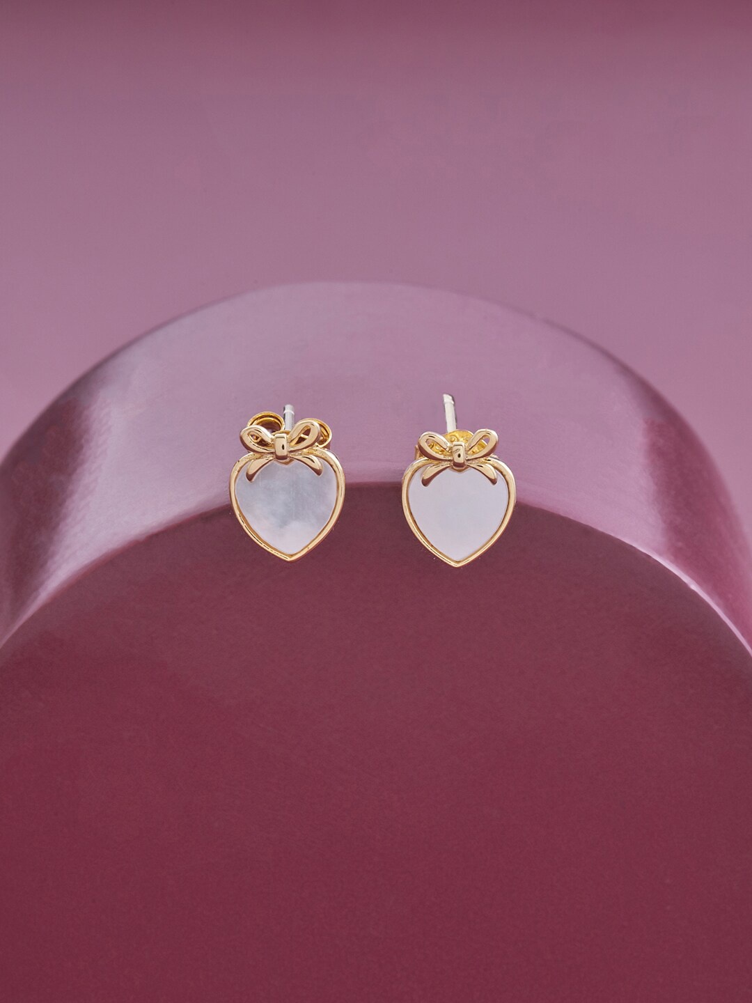 

Kushal's Fashion Jewellery White Contemporary Gold Plated Studs Earrings