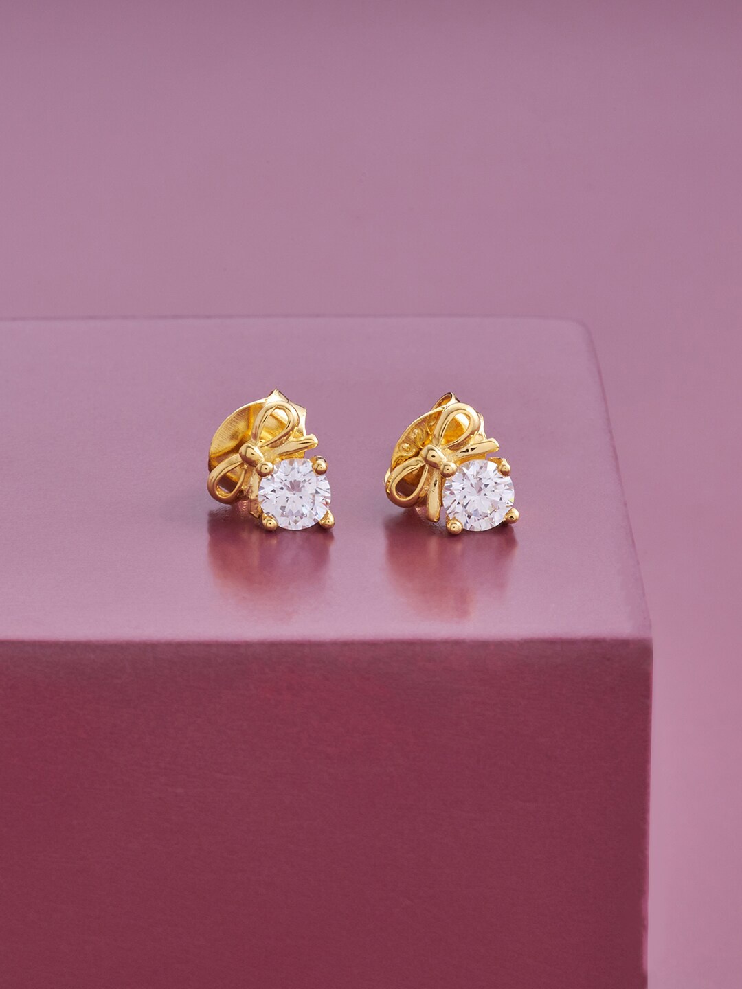 

Kushal's Fashion Jewellery White Contemporary Gold-Plated Studs Earrings