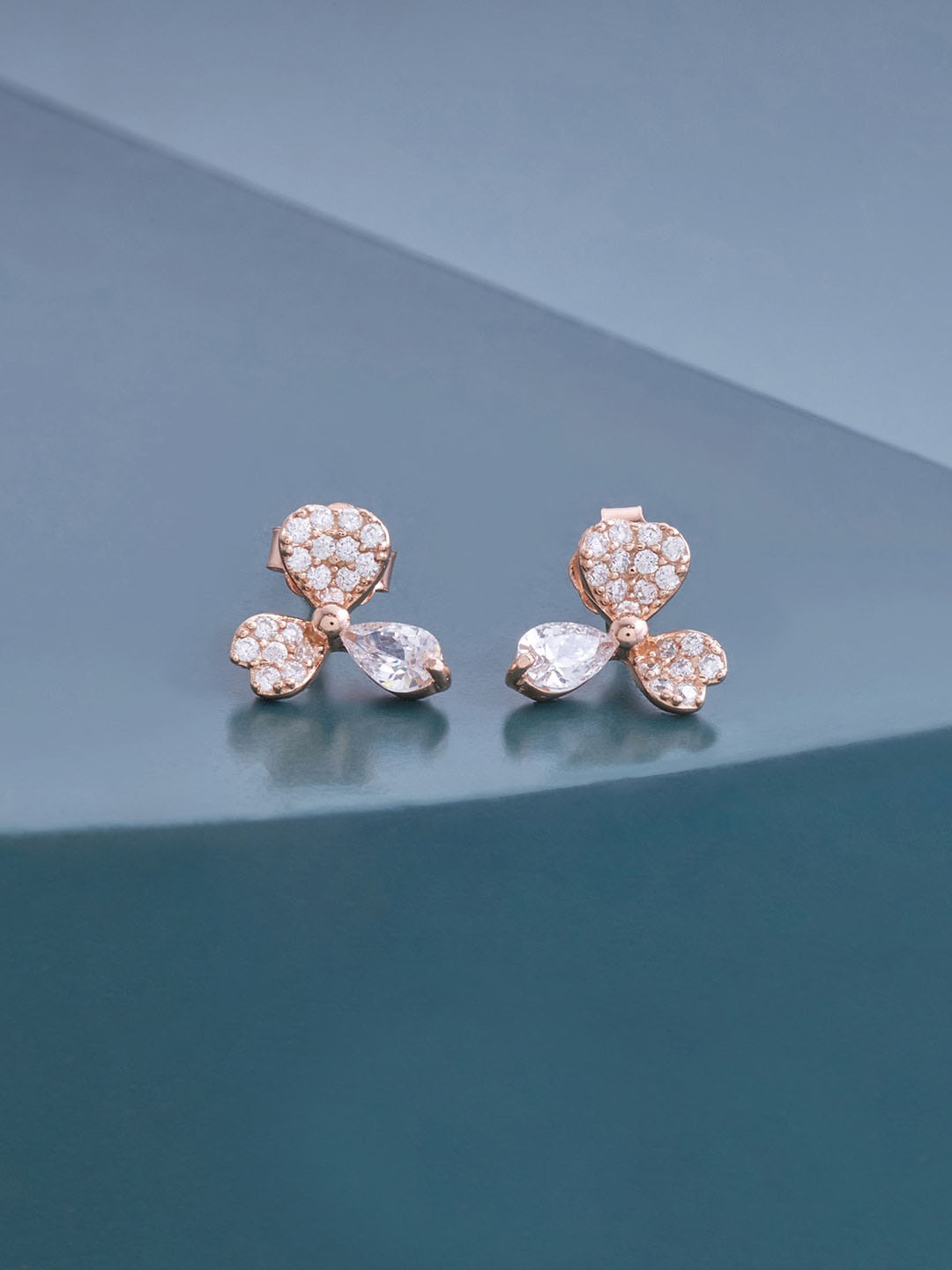 

Kushal's Fashion Jewellery White Contemporary Rose Gold-Plated Studs Earrings