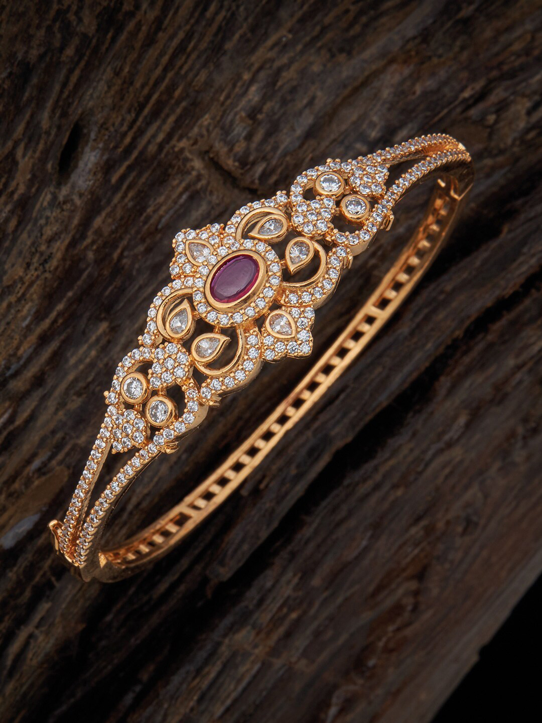 

Kushal's Fashion Jewellery Women Cubic Zirconia Gold-Plated Kada Bracelet