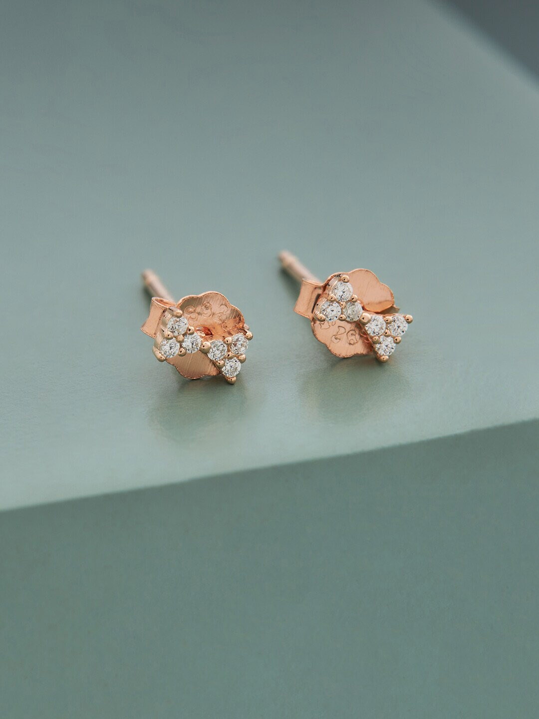 

Kushal's Fashion Jewellery Rose Gold Polish White 92.5 Pure Silver Contemporary Studs Earrings