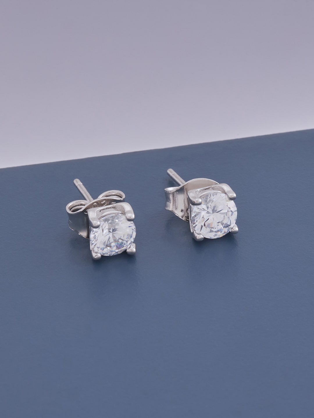 

Kushal's Fashion Jewellery White Contemporary Studs Earrings