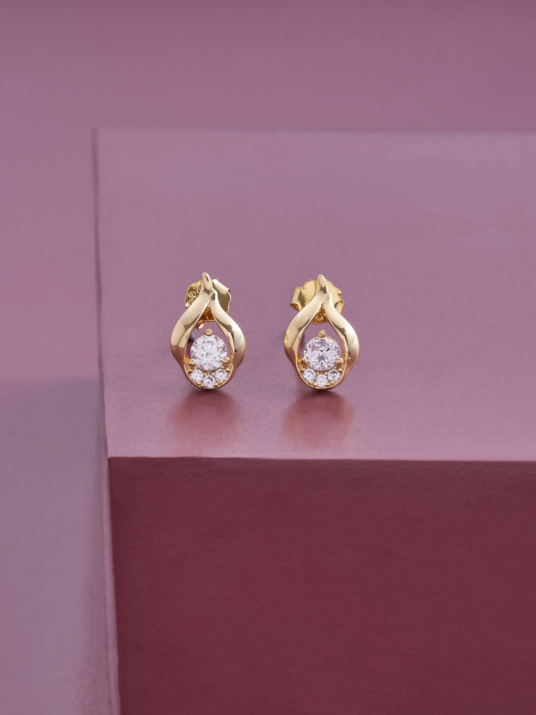 

Kushal's Fashion Jewellery Gold-Plated Contemporary Studs Earrings