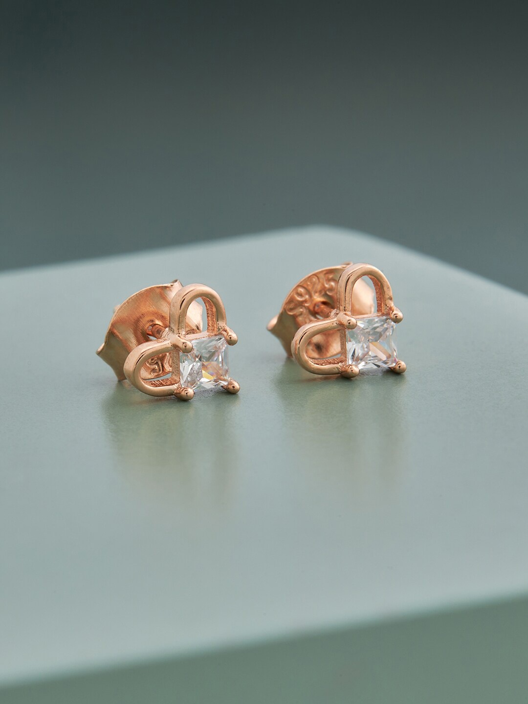 

Kushal's Fashion Jewellery Rose Gold - Plated Contemporary Studs Earrings
