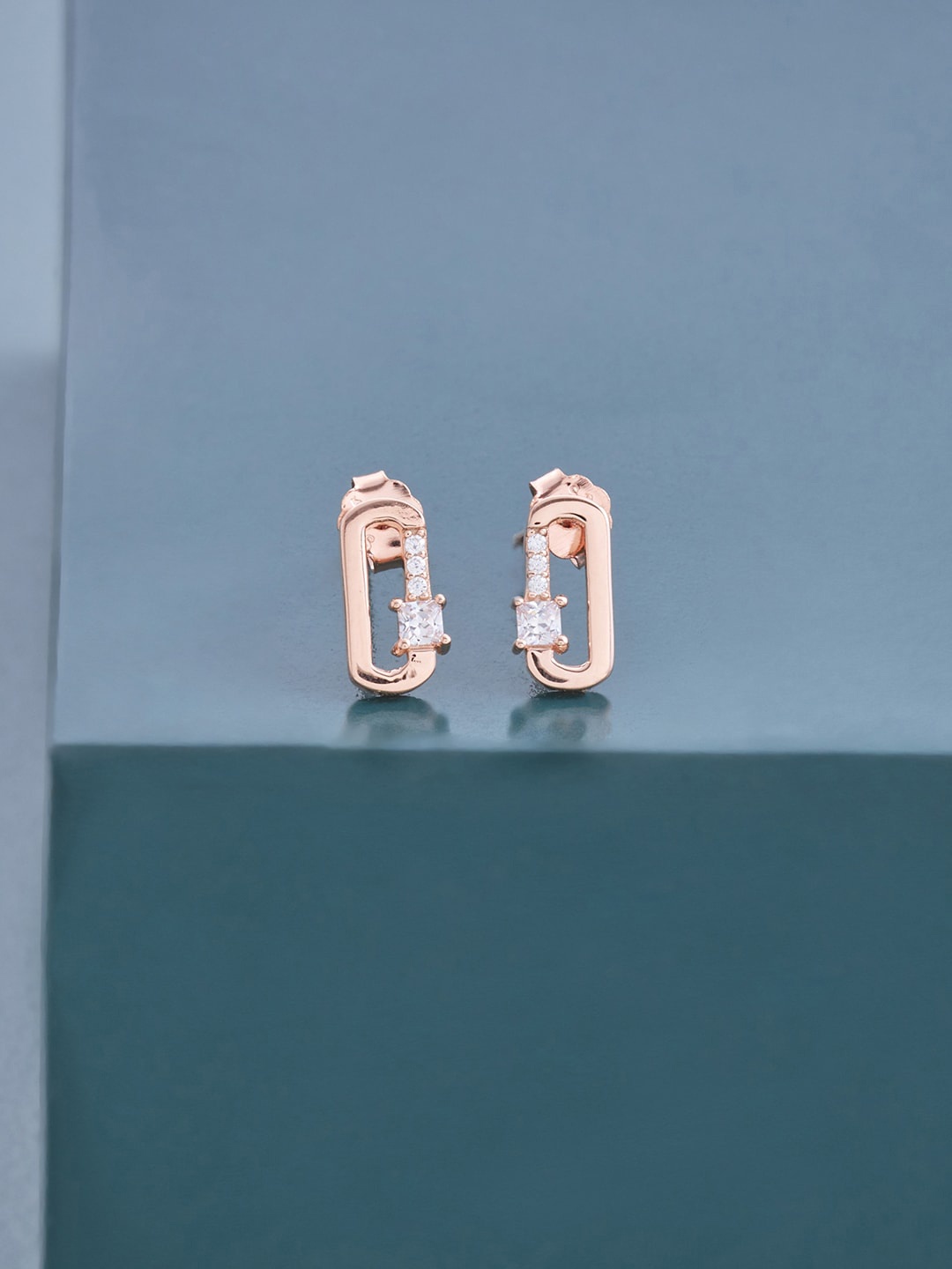 

Kushal's Fashion Jewellery White Contemporary Studs Earrings