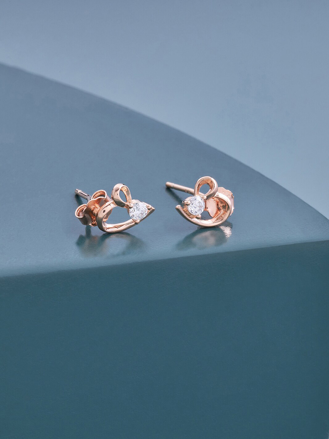 

Kushal's Fashion Jewellery Rose Gold Plated Contemporary Studs Earrings, White