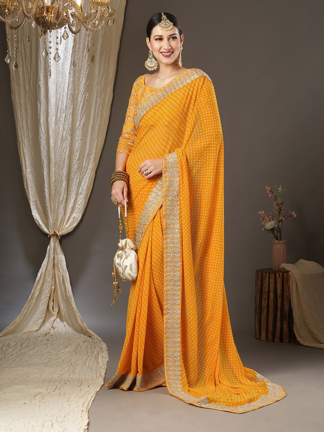 

Mitera Bandhani Pure Georgette Bandhani Saree, Yellow