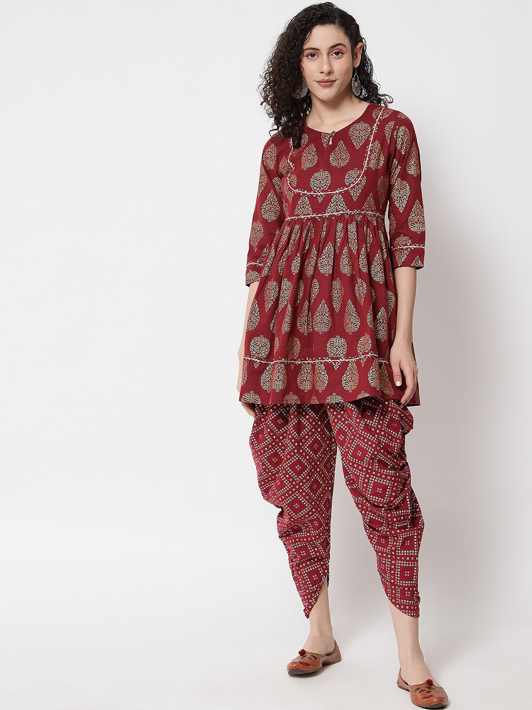 

Meeranshi Women Floral Printed Angrakha Gotta Patti Kurta with Dhoti Pants, Maroon