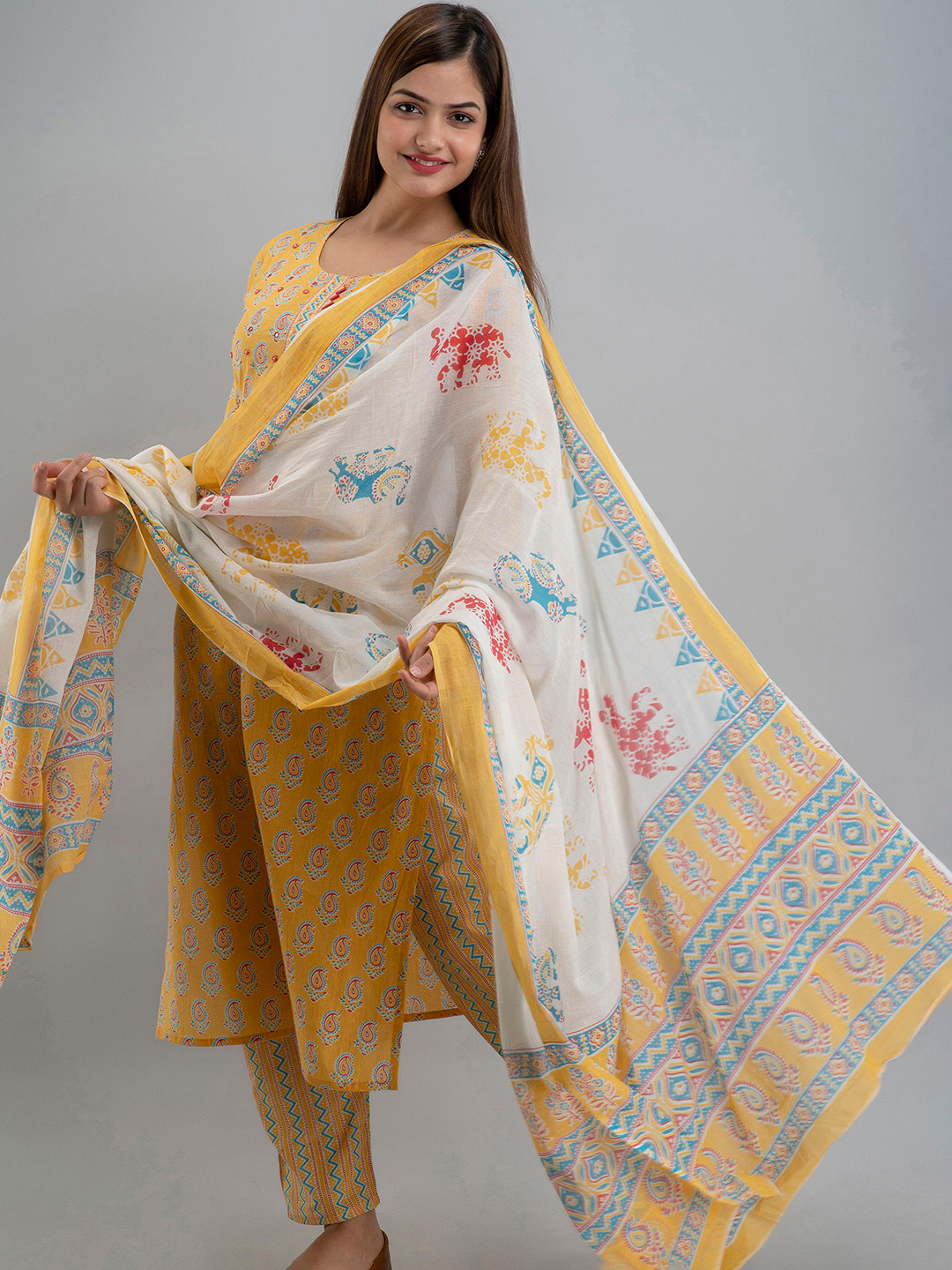 

OMASK Women Floral Printed Mirror Work Pure Cotton Kurta with Trousers & Dupatta, Yellow