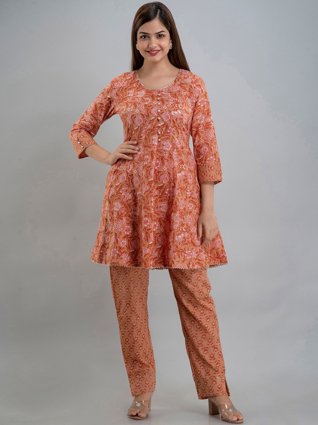 

OMASK Women Floral Printed Pleated Pure Cotton Kurti with Pyjamas, Rust