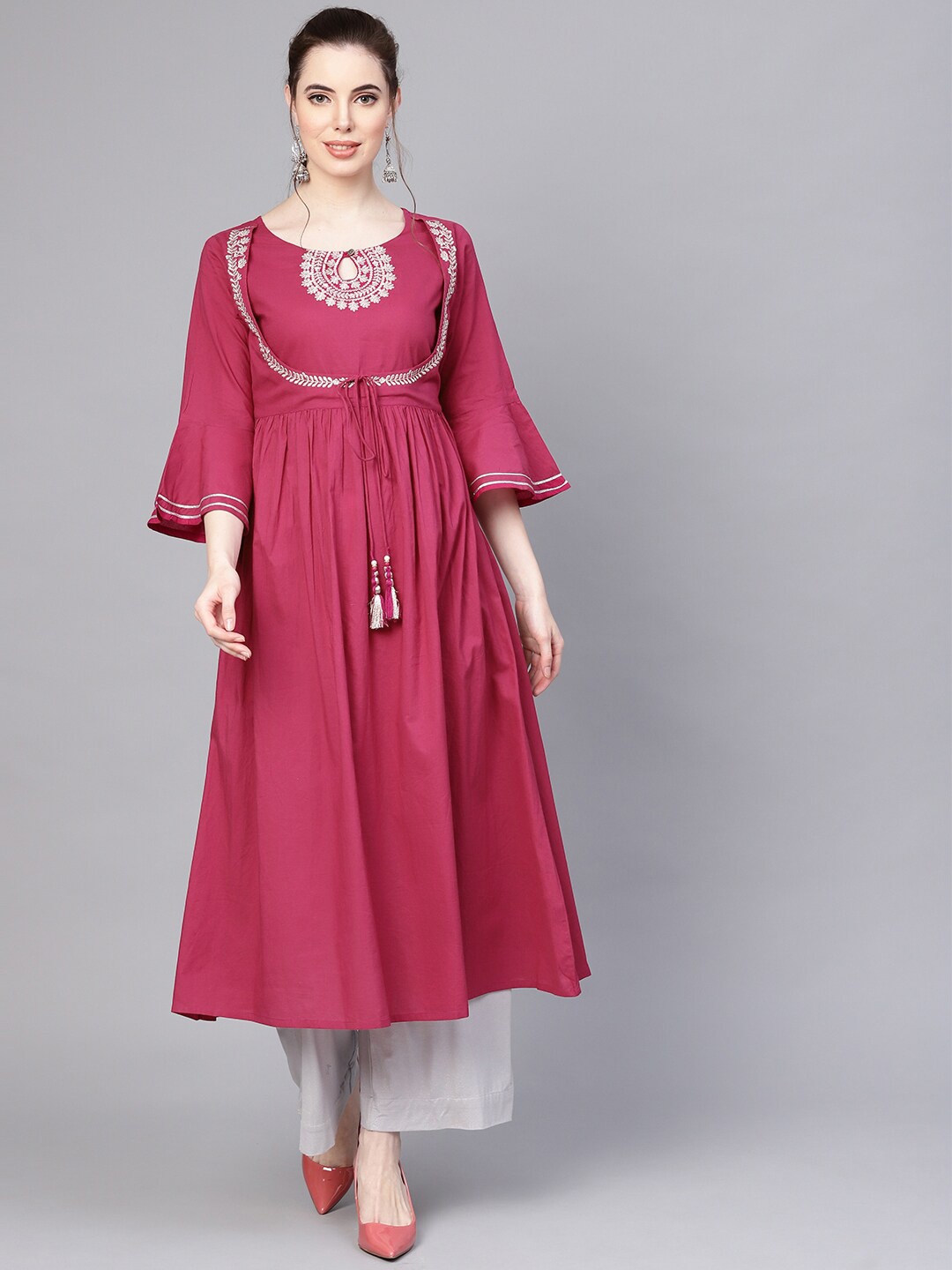 

KSUT Keyhole Neck Yoke Design Flared Sleeves Thread Work Panelled Pure Cotton Kurta, Magenta