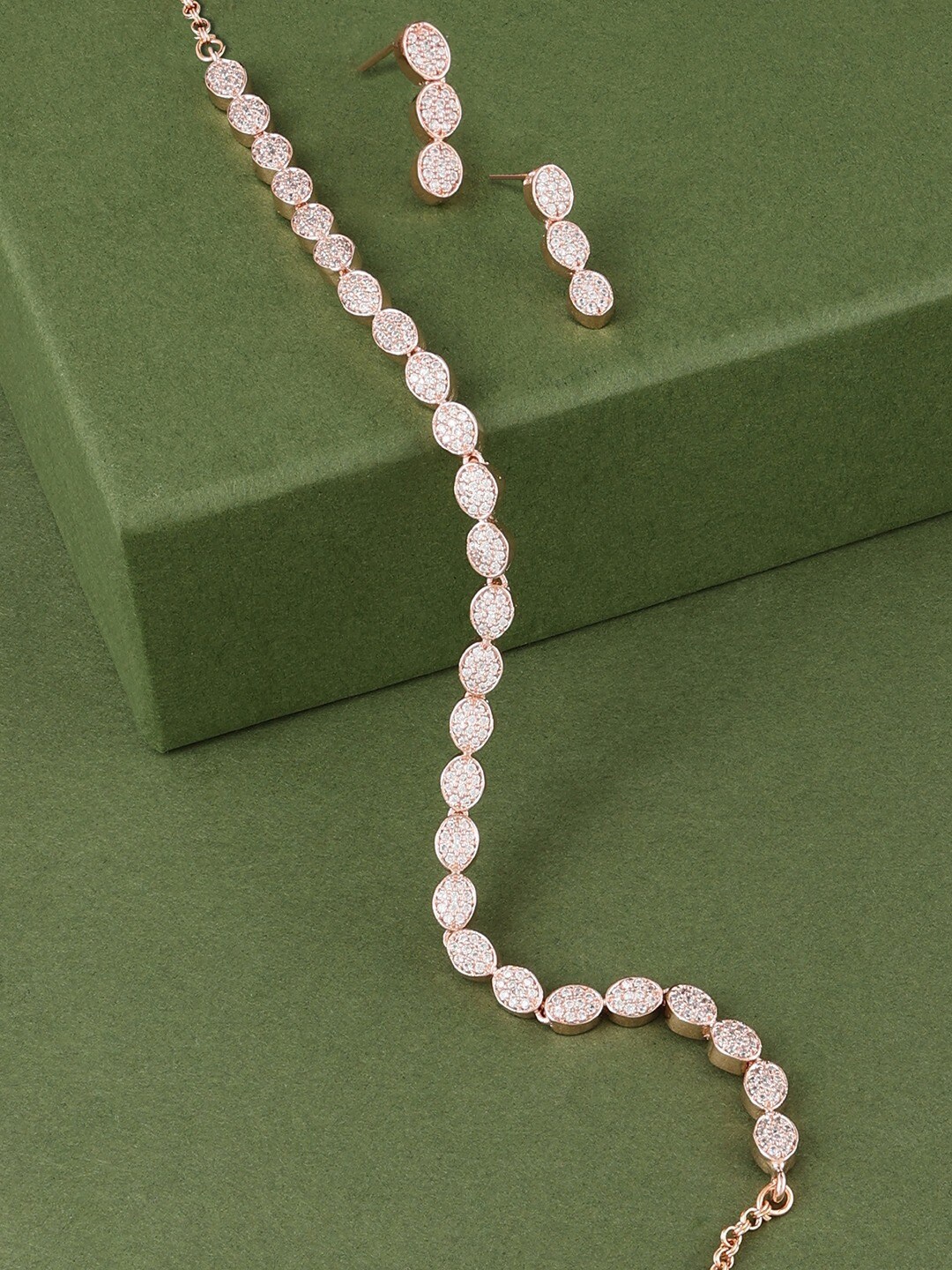 

Zaveri Pearls Women Rose Gold-Plated Cubic Zirconia Stone-Studded Jewellery Set