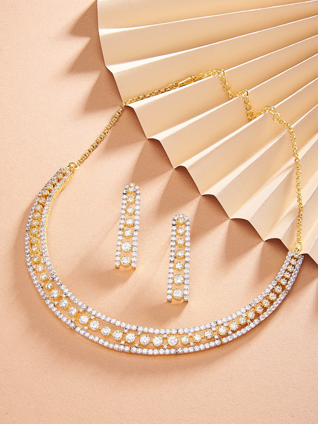 

Zaveri Pearls Gold-Plated & Cubic Zirconia Stone-Studded Jewellery Set