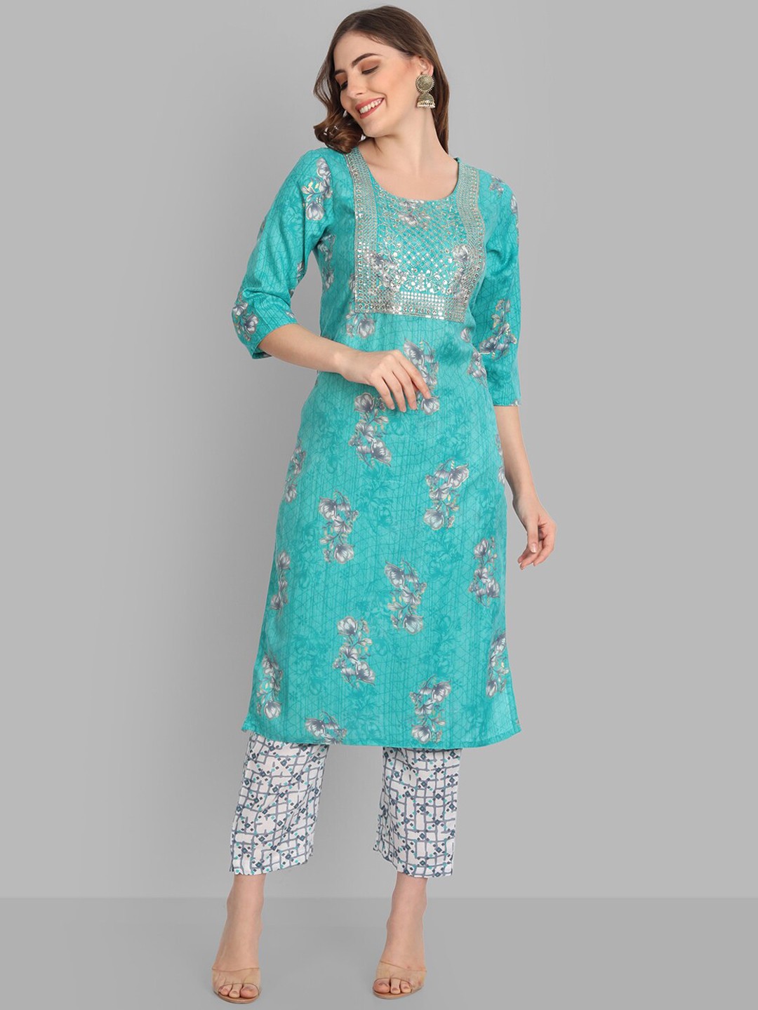 

SINGNI Women Floral Printed Sequinned Kurta with Trousers, Turquoise blue