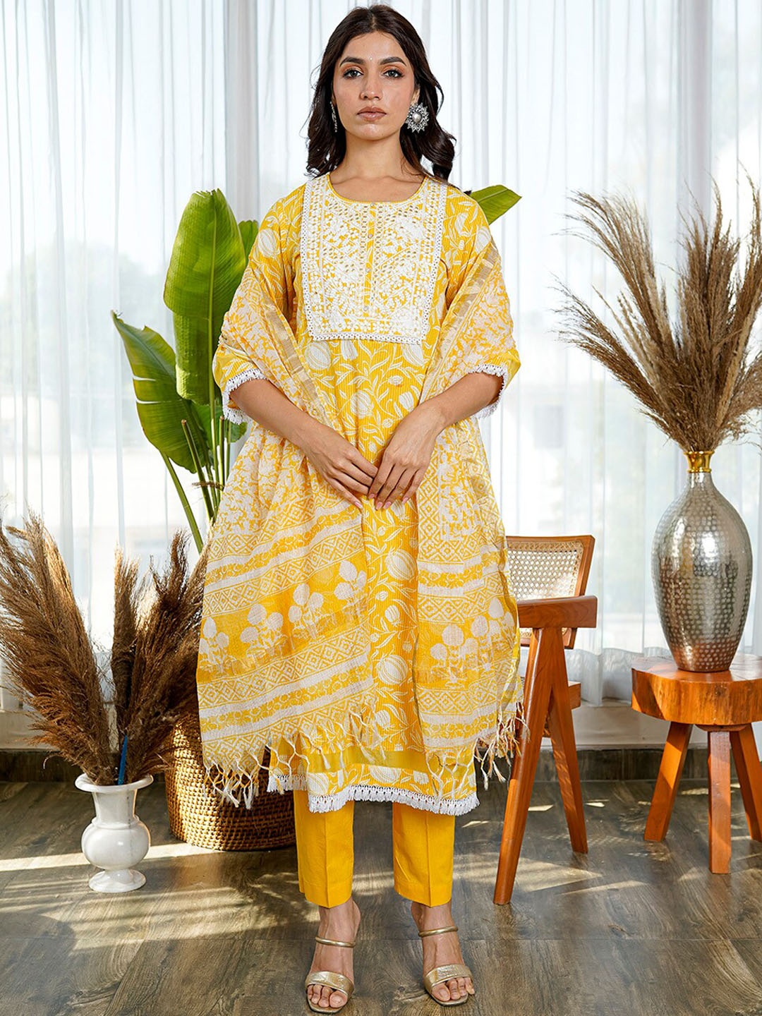 

KAMODINEE Women Yellow Floral Printed Mirror Work Pure Cotton Kurta with Trousers & With Dupatta