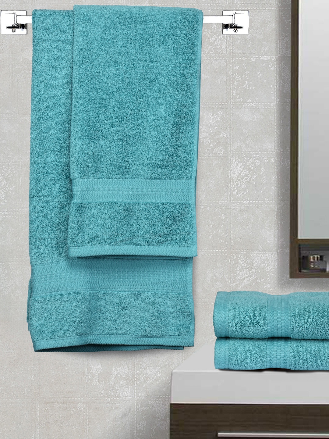 

BOMBAY DYEING Super Ultrx Zero Tuest Blue Set Of 4 600 GSM Soft & Durable Cotton Towel Set