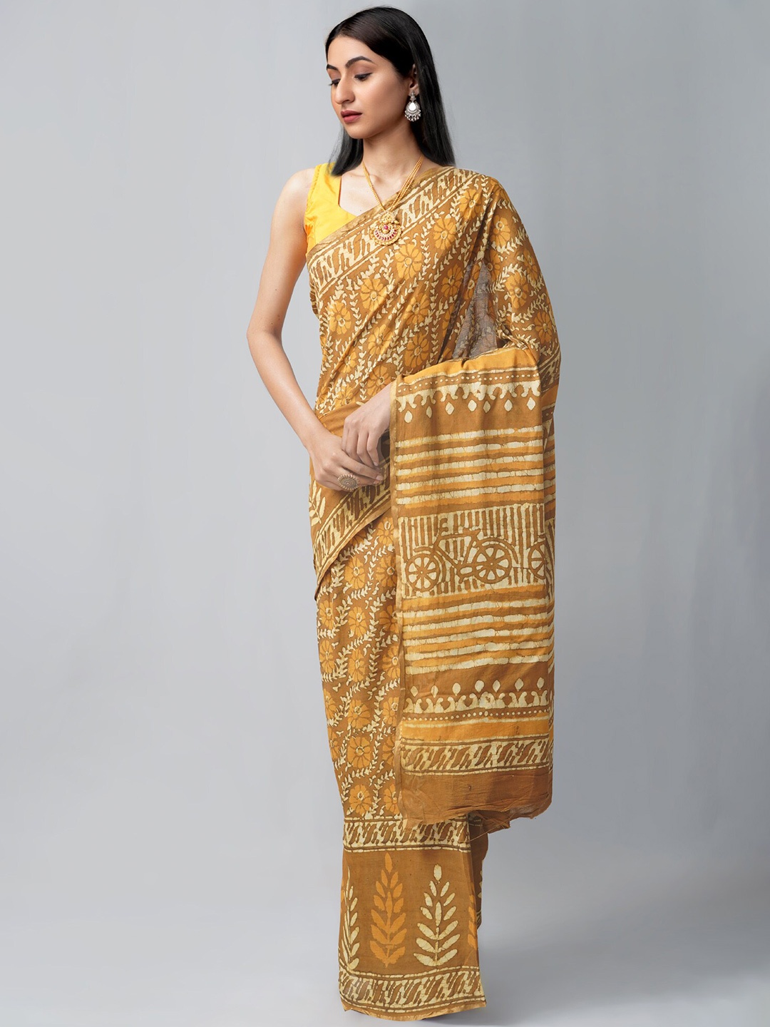 

Unnati Silks Dabu Print Pure Cotton Zari Saree, Yellow