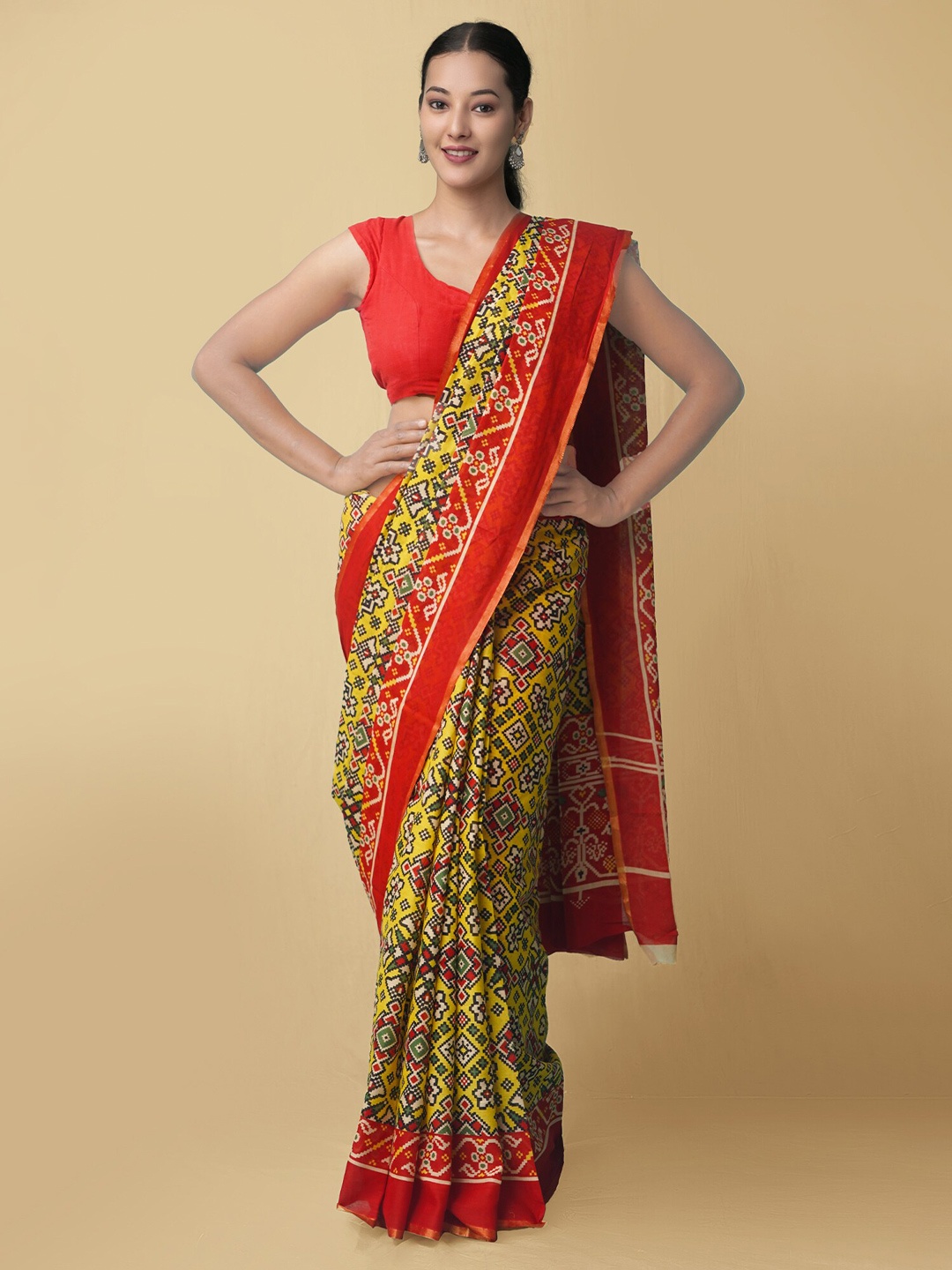 

Unnati Silks Ajrakh Printed Pure Cotton Patola Saree, Yellow