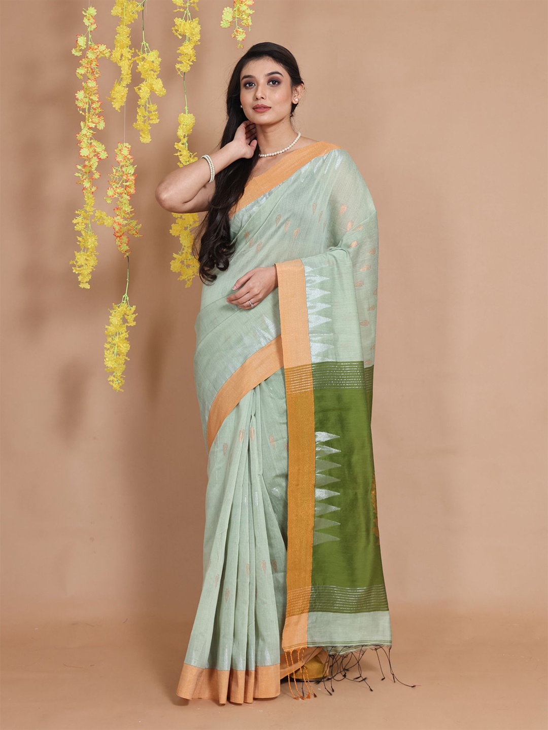 

Charukriti Green & Silver-Toned Woven Design Zari Saree