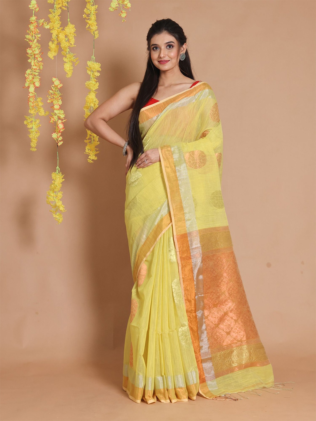 

Charukriti Woven Design Zari Tissue Saree, Yellow