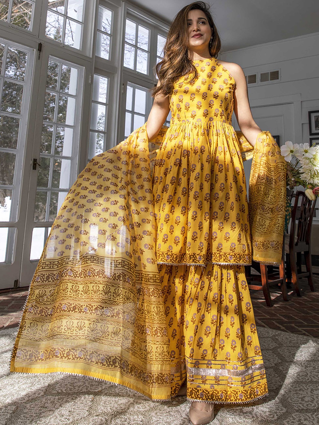 

AACHHO Women Mustard Yellow Printed Pleated Pure Cotton Kurta with Sharara & Dupatta