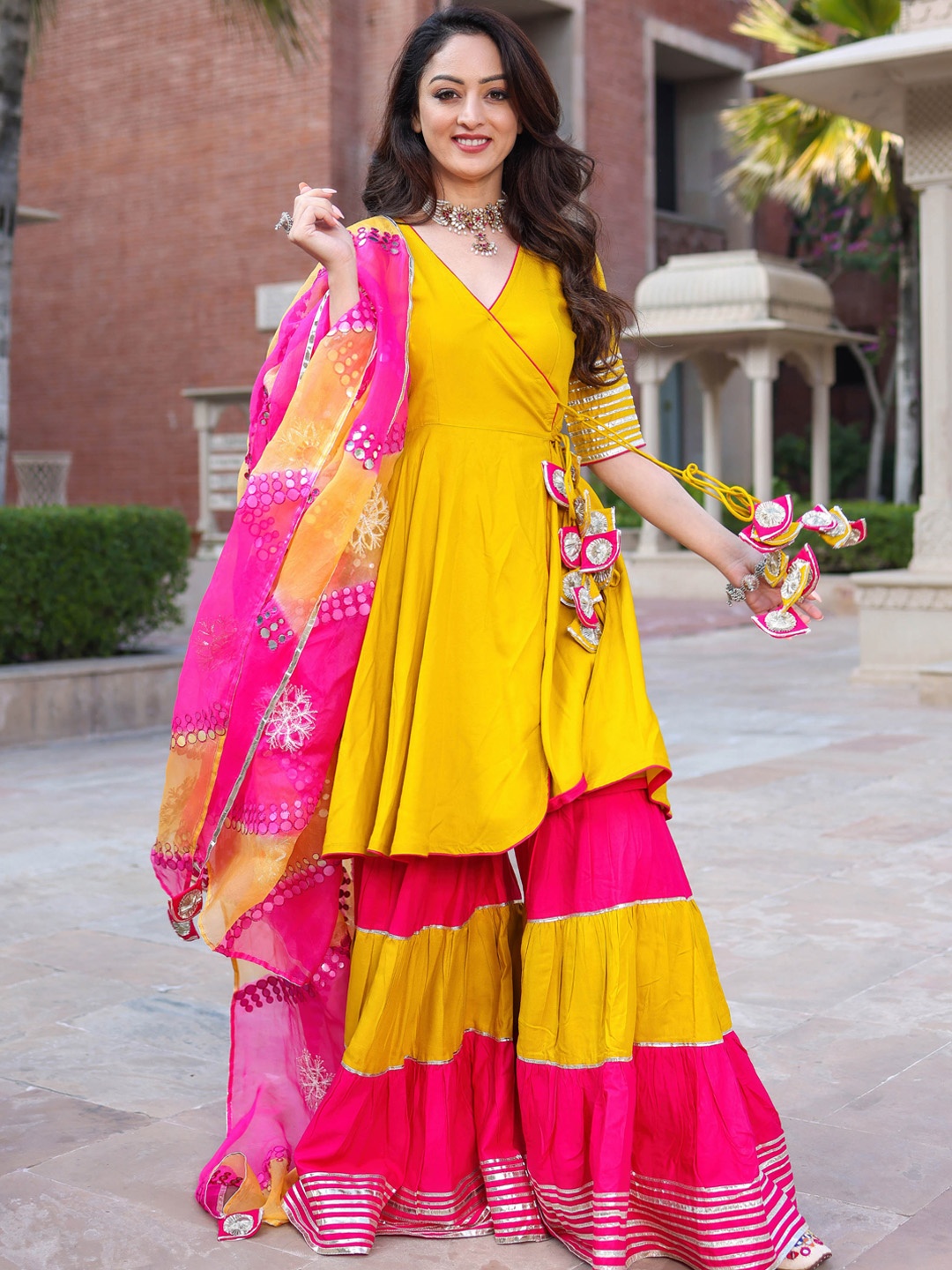 

AACHHO Women Mustard Yellow Angrakha Gotta Patti Kurta With Sharara & With Dupatta