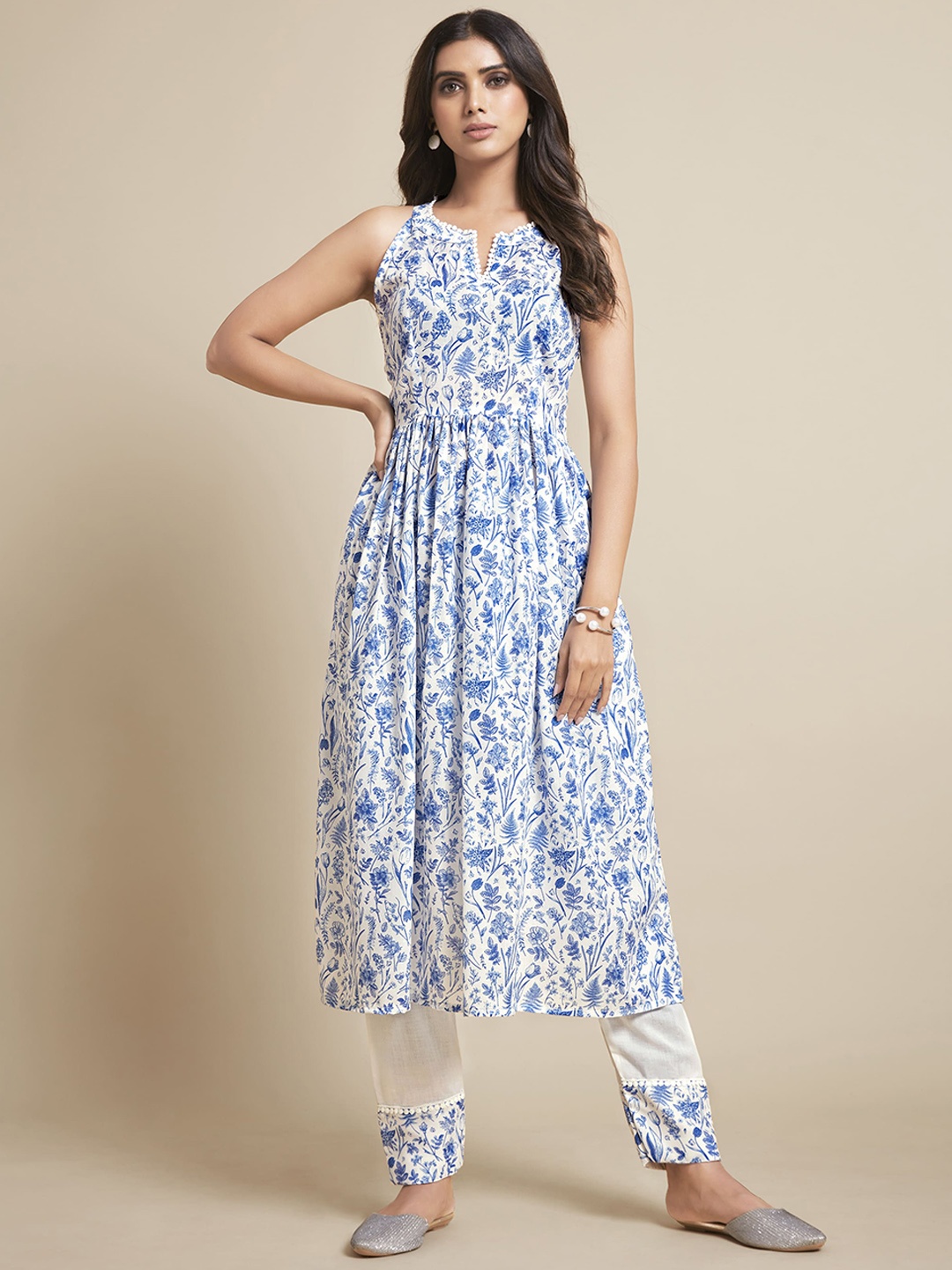 

Sangria Women Blue Floral Printed Pleated Kurta with Trousers