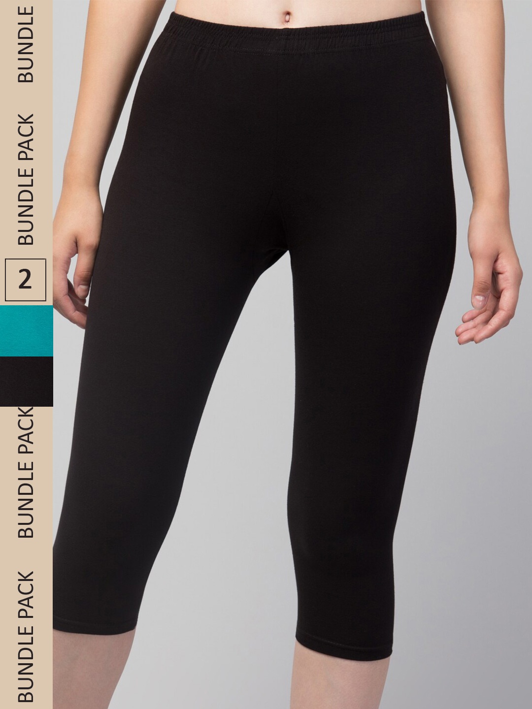 

Apraa & Parma Women Black & Teal Skinny Fit Capris