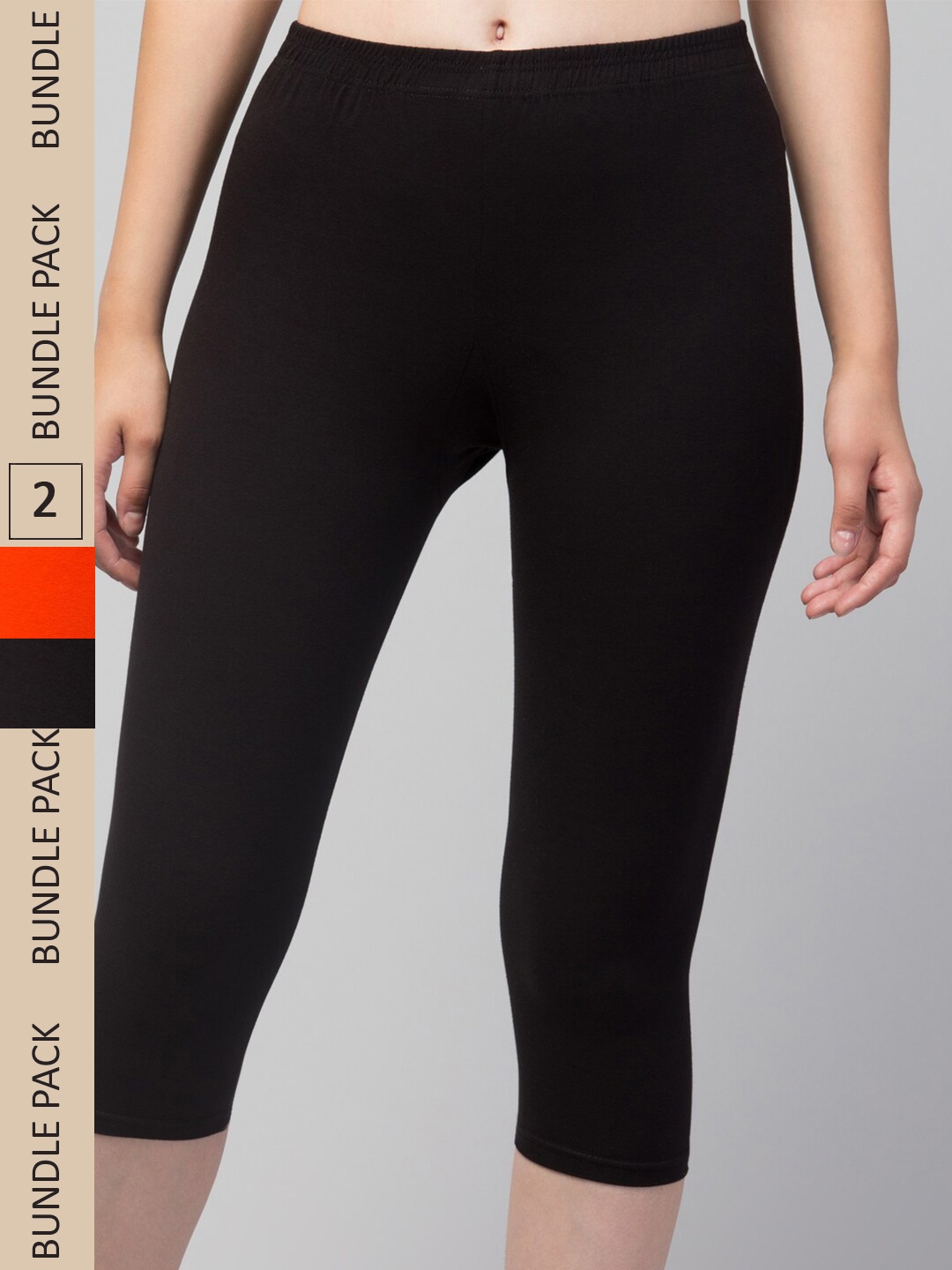 

Apraa & Parma Women Black & Orange Skinny Fit Capris