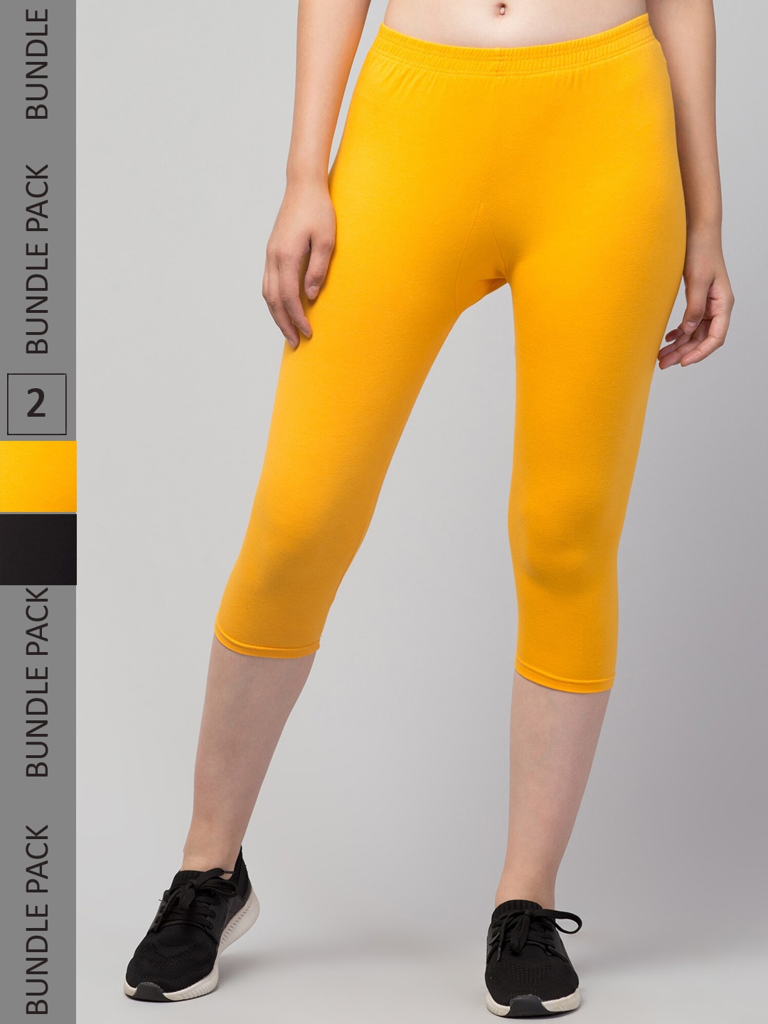 

Apraa & Parma Women Black & Yellow Skinny Fit Capris