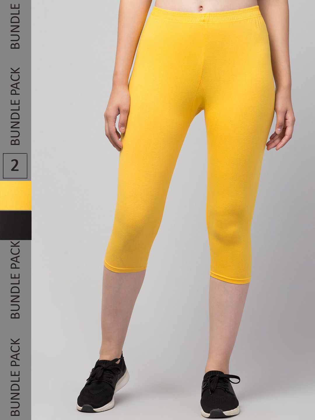 

Apraa & Parma Women Black & Yellow Skinny Fit Capris