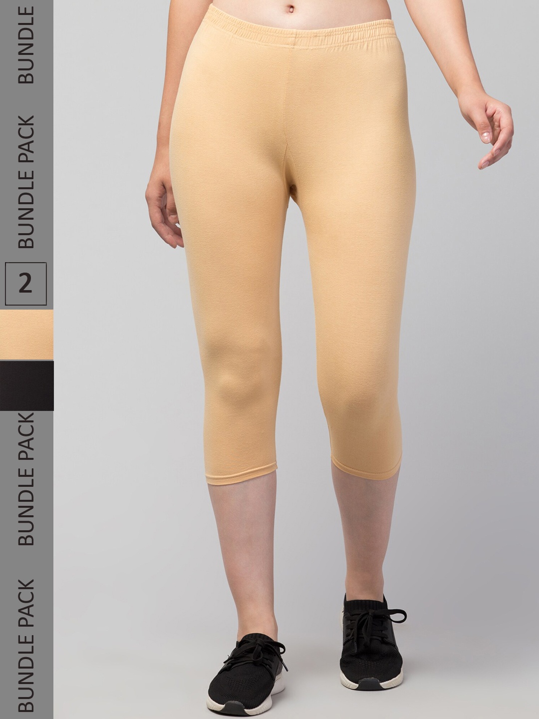 

Apraa & Parma Women Black & Beige Skinny Fit Capris