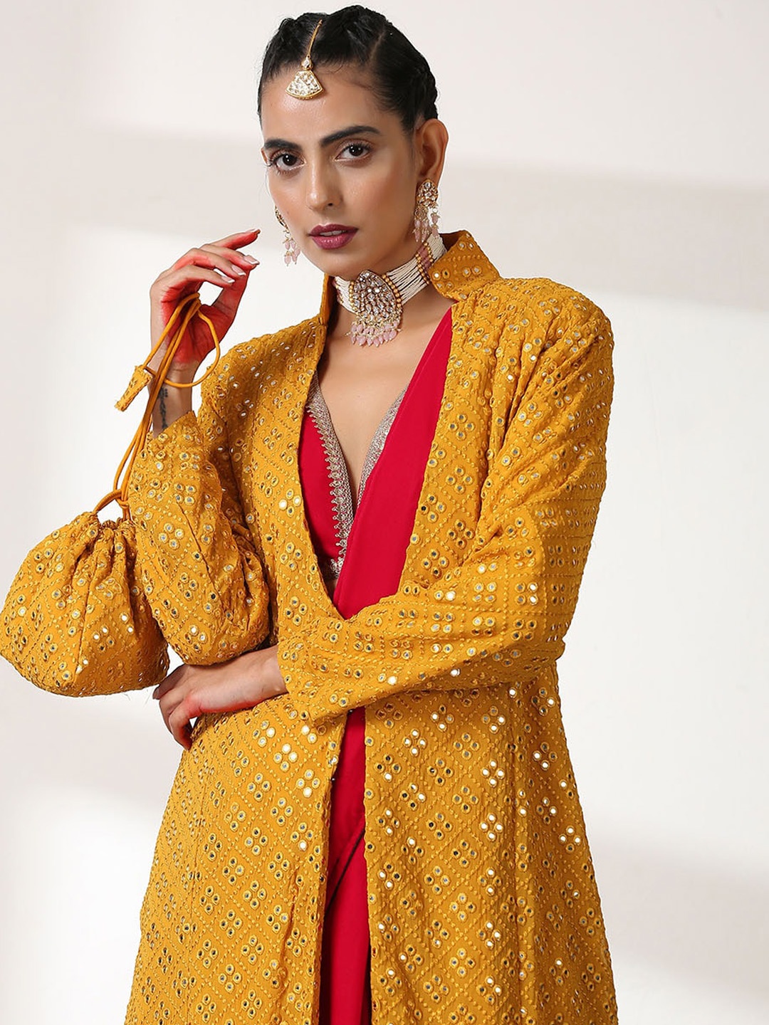 

Swtantra Yellow Embellished Potli Clutch