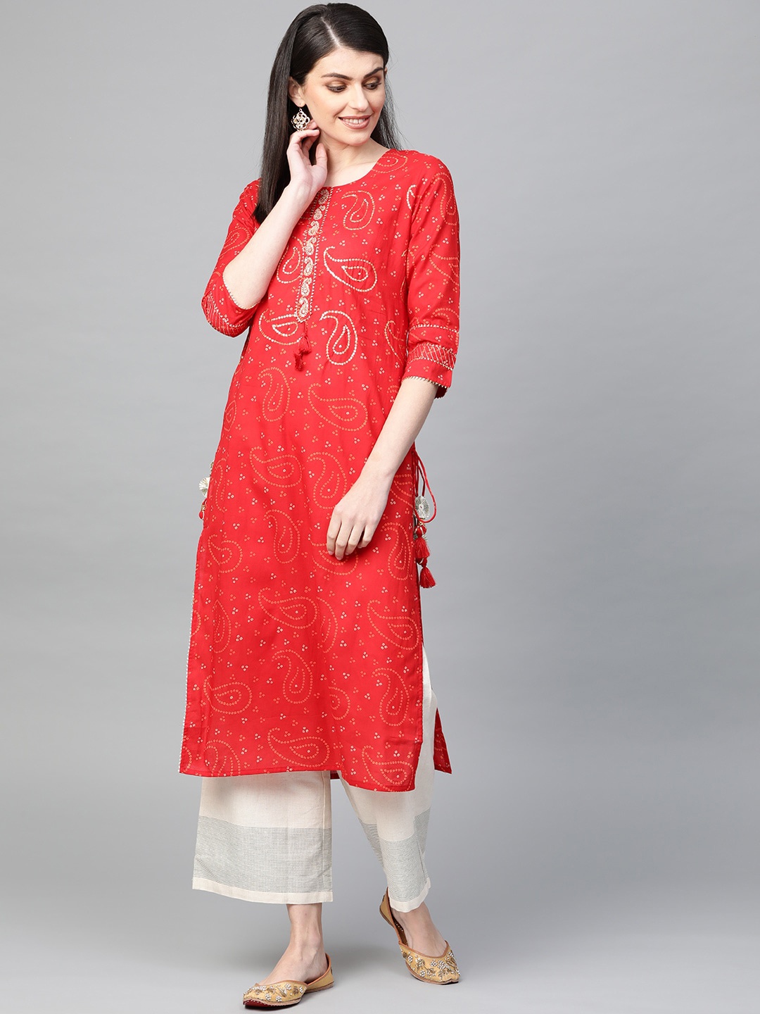 

Ishin Women Red Paisley Embellished Gotta Patti Cotton Kurta