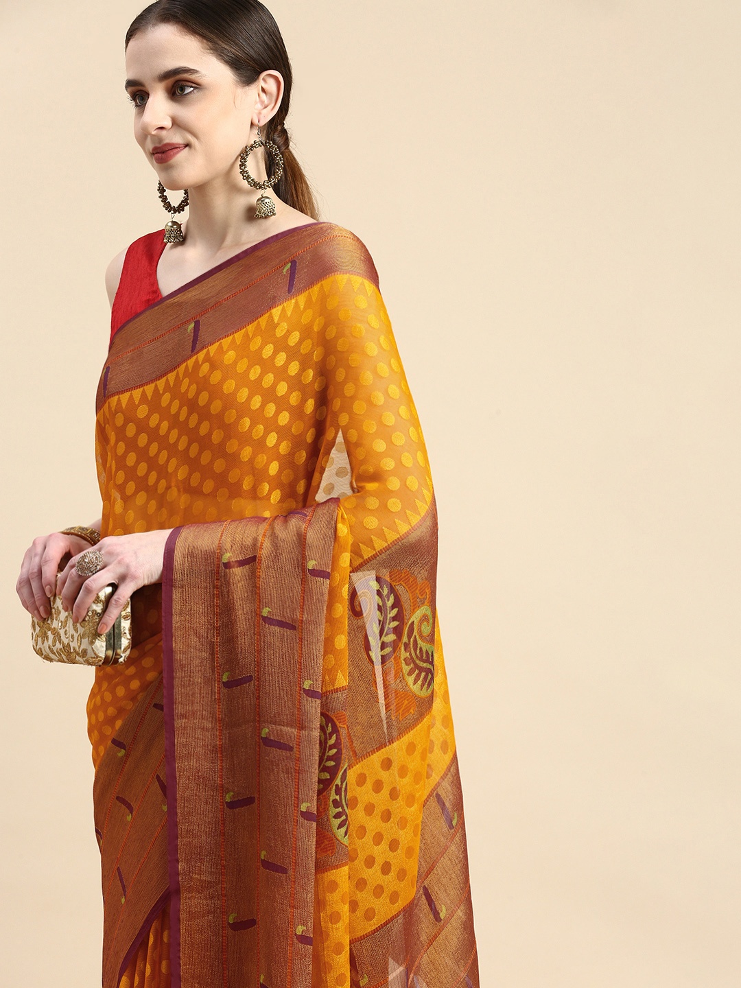 

Winza Designer Woven Design Zari Brasso Banarasi Saree, Yellow