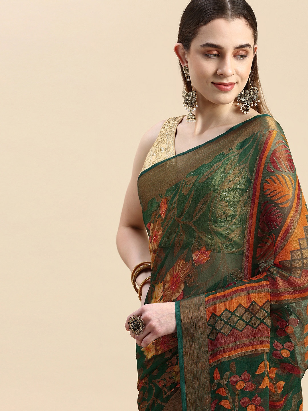 

Winza Designer Woven Design Floral Zari Brasso Banarasi Saree, Green