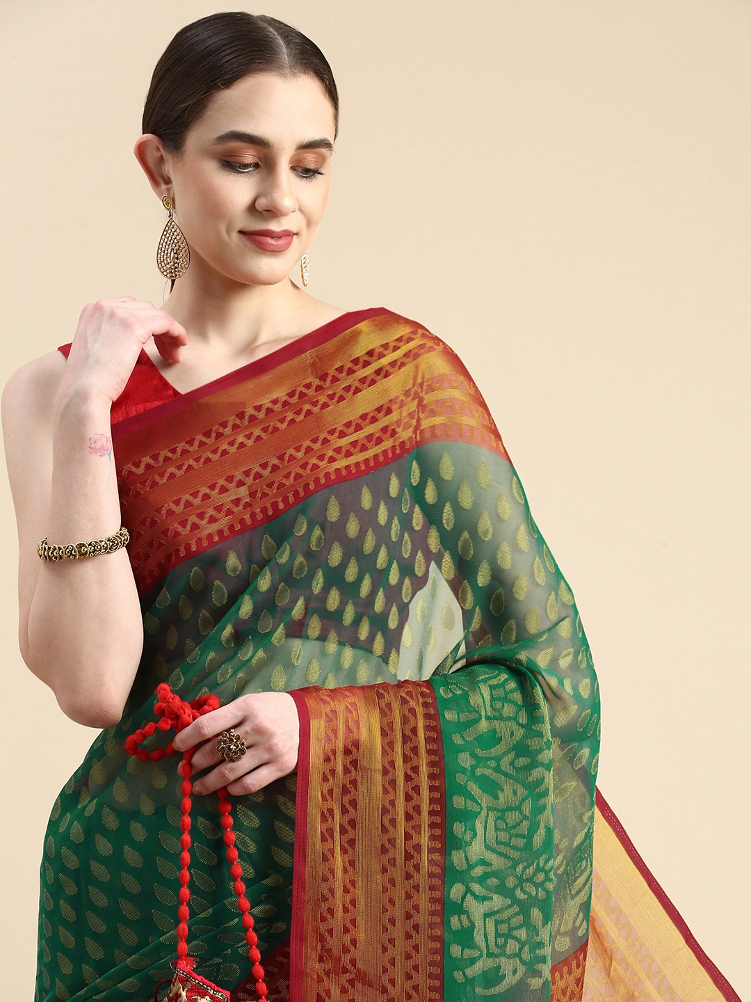 

Winza Designer Woven Design Ethnic Motifs Zari Brasso Banarasi Saree, Teal