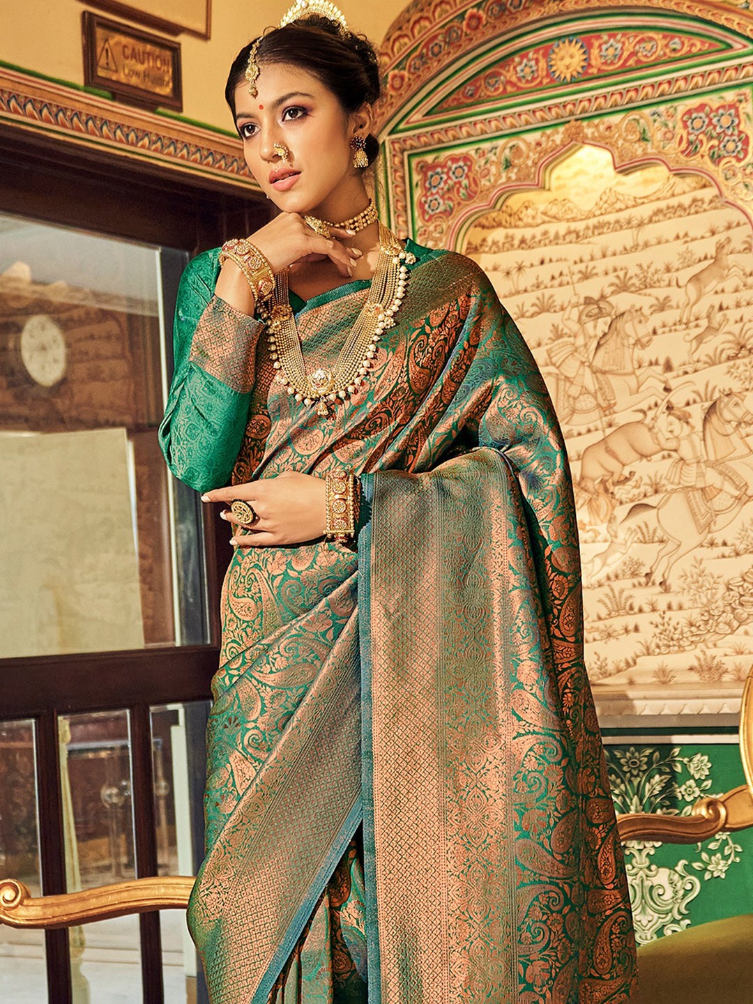 

KARAGIRI Green & Rose Gold Ethnic Motifs Zari Silk Blend Kanjeevaram Saree