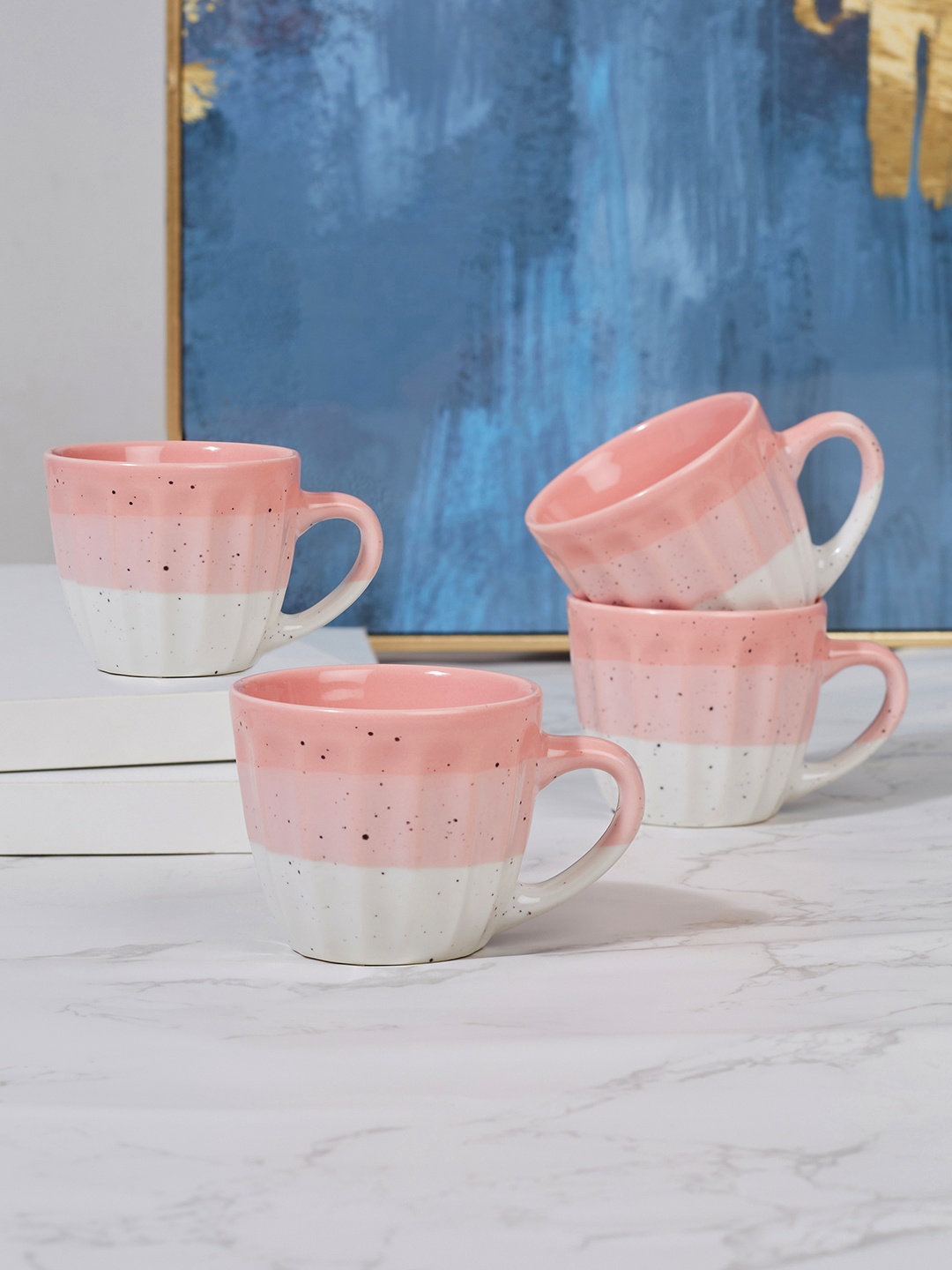 

HomeTown Emilia Pink & White Set of 4 Printed Ceramic Glossy Mugs 100 ml