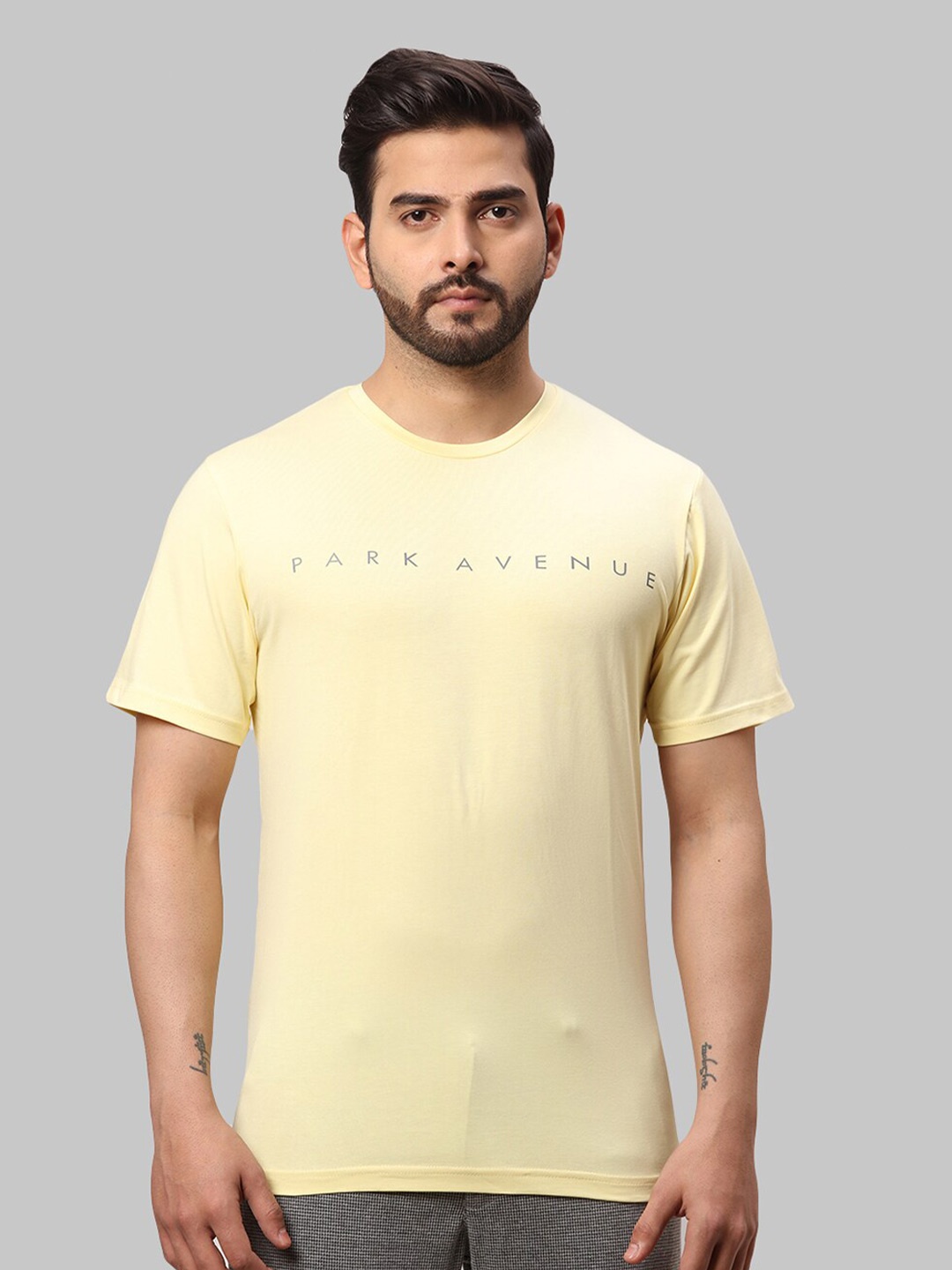 

Park Avenue Men Slim Fit Cotton T-shirt, Yellow